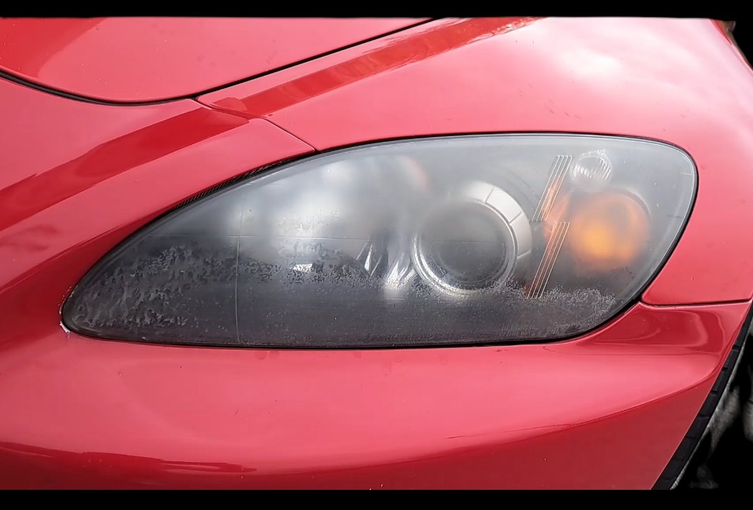 Honda S2000 headlight before restoration